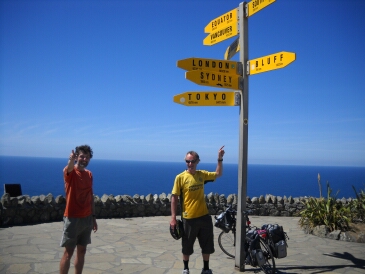 Guy and Steve at Cape Reinga and pointing to Cape Bluff