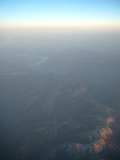 sunset over the mountains from a BA flight